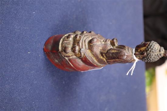 A Chinese lacquered bronze figure of Buddha Shakyamuni, 17th century, H. 14.5cm
